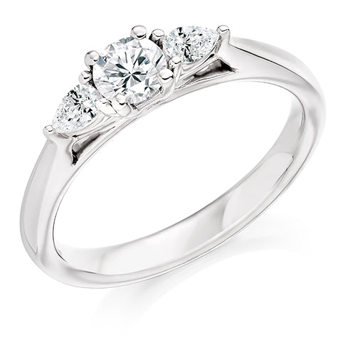 Round Brilliant Trilogy Ring With Pear Cut Shoulders