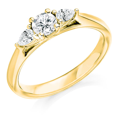 Round Brilliant Trilogy Ring With Pear Cut Shoulders