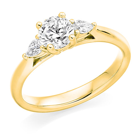 Round Brilliant Trilogy Ring With Pear Cut Shoulders